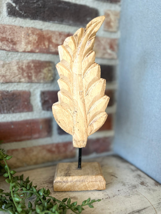 Houten veer op standaard