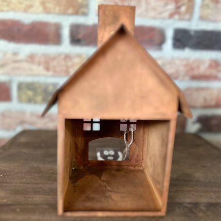 Metalen huisje Roest