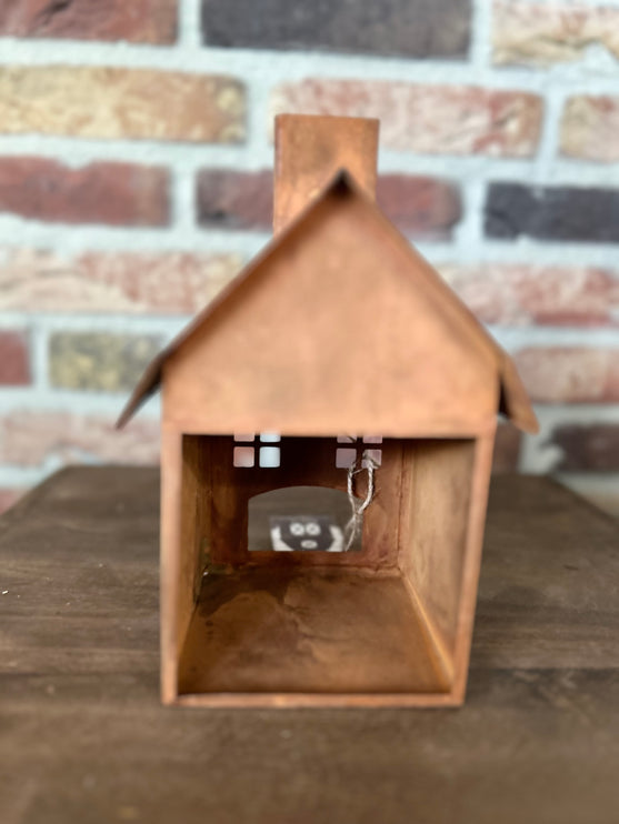 Metalen huisje Roest