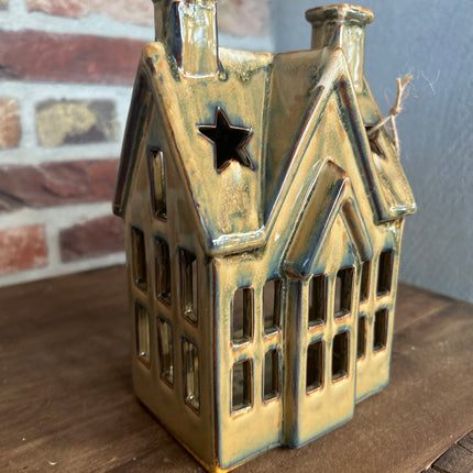 Keramieken huis ster
