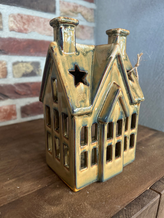 Keramieken huis ster