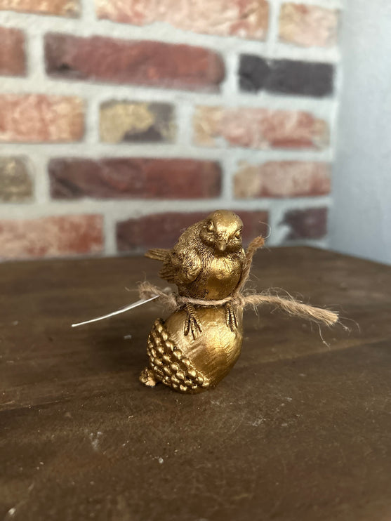 Gouden Vogeltje op eikel