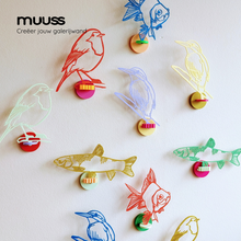 Ijsvogel aan de muur